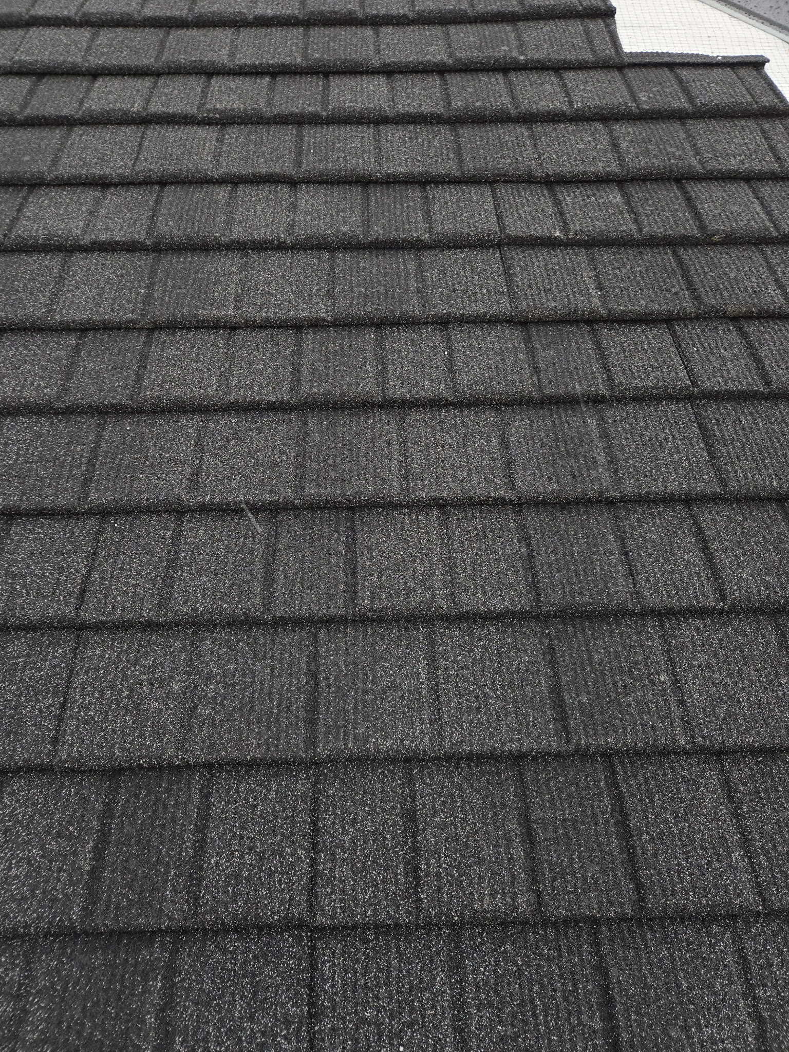 Ridge line of a WeatherLok stone-coated steel roof