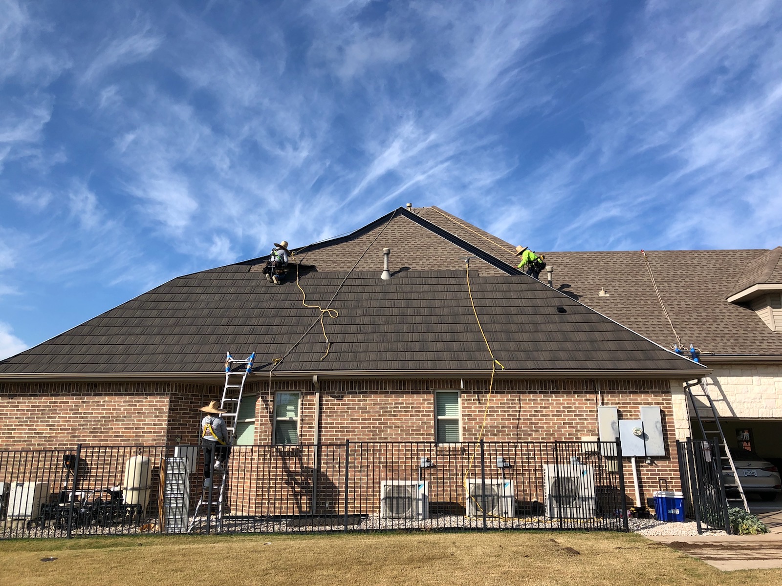 WeatherLok crew installing a stone-coated steel shake roof